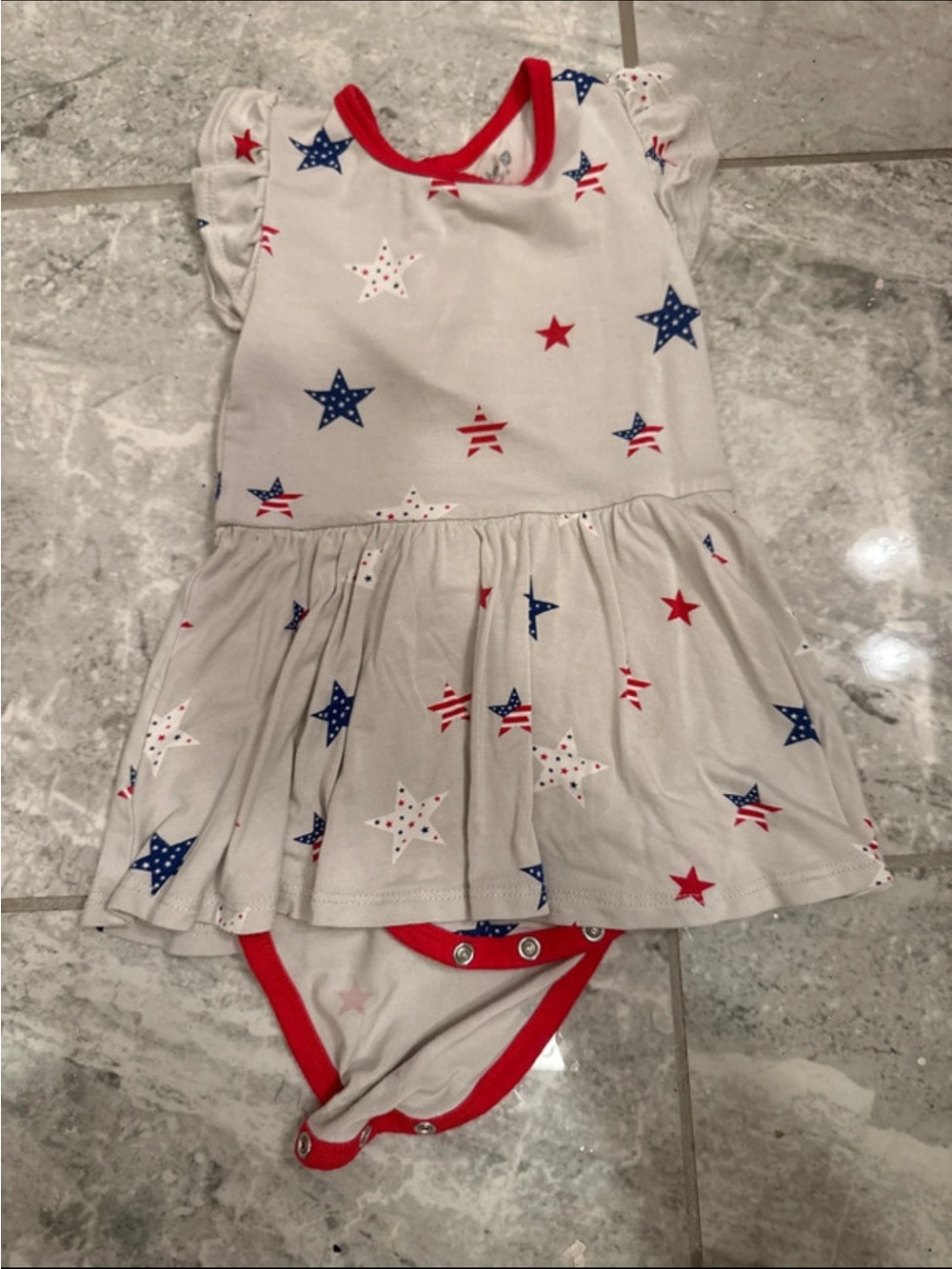 Kyte BABY Cream Dress and Onesie with Red and Blue Star Print